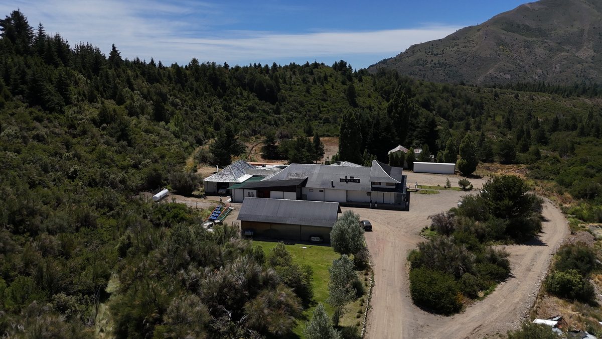 Aerial view of Manila processing plant nestled in Patagonian forest